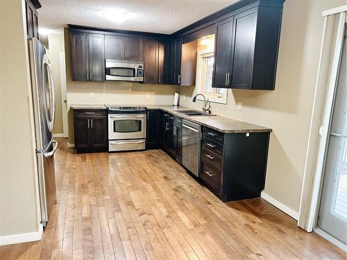 5411 51 Avenue, Rocky Mountain House, AB - Indoor Photo Showing Kitchen With Double Sink