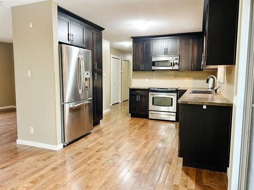 5411 51 Avenue, Rocky Mountain House, AB - Indoor Photo Showing Kitchen With Double Sink