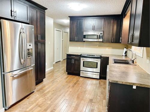 5411 51 Avenue, Rocky Mountain House, AB - Indoor Photo Showing Kitchen With Double Sink