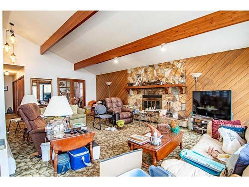 181 Grand Avenue, Norglenwold, AB - Indoor Photo Showing Living Room With Fireplace