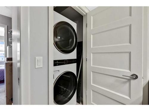 2206-10 Market Boulevard, Airdrie, AB - Indoor Photo Showing Laundry Room