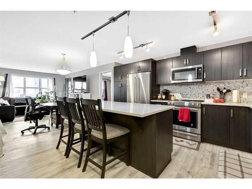 2206-10 Market Boulevard, Airdrie, AB - Indoor Photo Showing Kitchen With Upgraded Kitchen