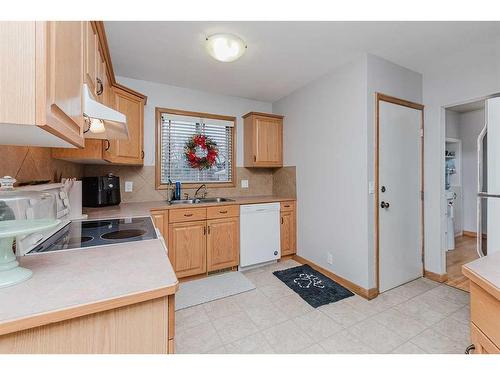 3927 40A Avenue, Red Deer, AB - Indoor Photo Showing Kitchen With Double Sink