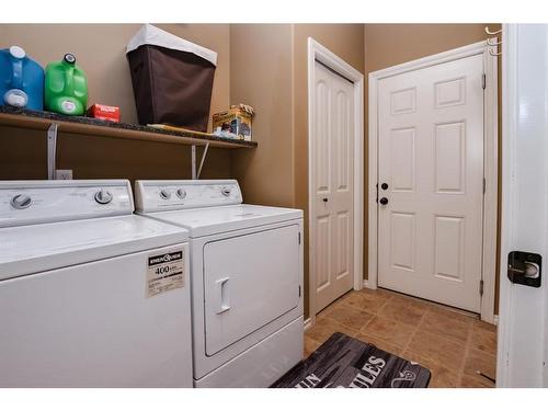 67 Burris Pointe, Lacombe, AB - Indoor Photo Showing Laundry Room