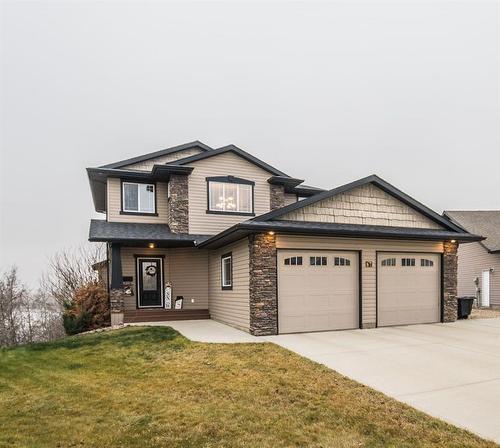 67 Burris Pointe, Lacombe, AB - Outdoor With Facade