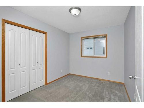 15 Hagerman Road, Sylvan Lake, AB - Indoor Photo Showing Other Room