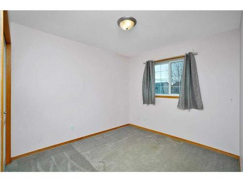 15 Hagerman Road, Sylvan Lake, AB - Indoor Photo Showing Other Room