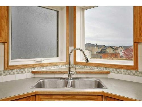 15 Hagerman Road, Sylvan Lake, AB - Indoor Photo Showing Kitchen With Double Sink