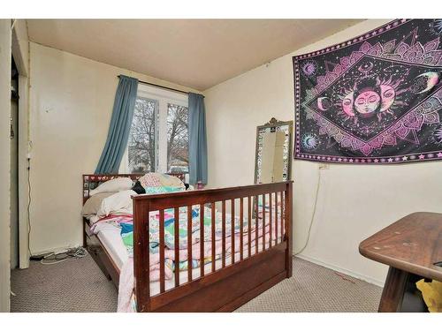 5039 46 Street North, Innisfail, AB - Indoor Photo Showing Bedroom