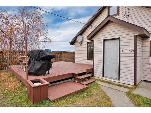 5039 46 Street North, Innisfail, AB - Outdoor With Deck Patio Veranda With Exterior