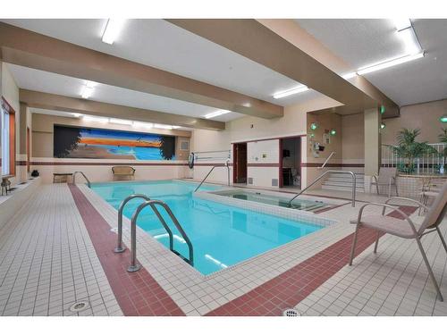 324-5300 48 Street, Red Deer, AB - Indoor Photo Showing Other Room With In Ground Pool