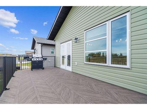 18 Metcalf Way, Lacombe, AB - Outdoor With Deck Patio Veranda With Exterior