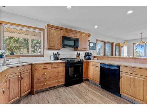 4-27111 Highway 597, Rural Lacombe County, AB - Indoor Photo Showing Kitchen With Double Sink