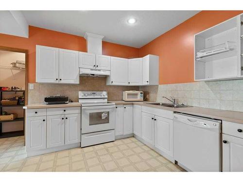 4-27111 Highway 597, Rural Lacombe County, AB - Indoor Photo Showing Kitchen With Double Sink