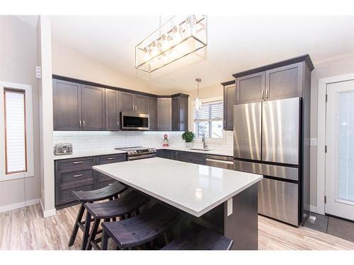 36 Kirby Street, Red Deer, AB - Indoor Photo Showing Kitchen With Stainless Steel Kitchen With Upgraded Kitchen