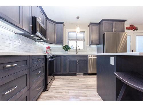 36 Kirby Street, Red Deer, AB - Indoor Photo Showing Kitchen With Stainless Steel Kitchen With Upgraded Kitchen