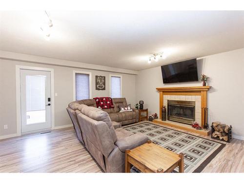 36 Kirby Street, Red Deer, AB - Indoor Photo Showing Living Room With Fireplace