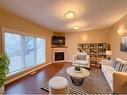 #2-5117 54 Avenue, Ponoka, AB  - Indoor Photo Showing Living Room With Fireplace 