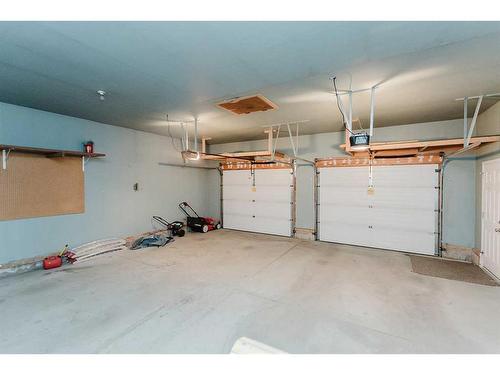 36 Burris Pointe, Lacombe, AB - Indoor Photo Showing Garage