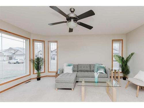 36 Burris Pointe, Lacombe, AB - Indoor Photo Showing Living Room