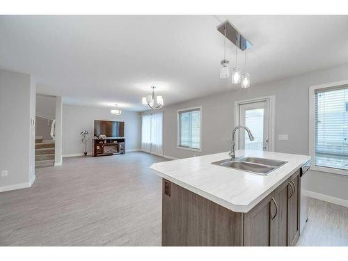 32 Ellington Crescent, Red Deer, AB - Indoor Photo Showing Kitchen With Double Sink