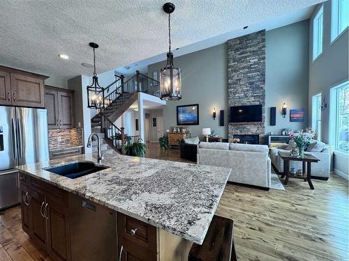 37 Drake Landing Ridge, Okotoks, AB - Indoor Photo Showing Kitchen With Double Sink With Upgraded Kitchen