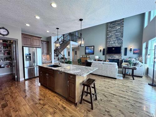 37 Drake Landing Ridge, Okotoks, AB - Indoor Photo Showing Kitchen With Upgraded Kitchen