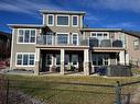 37 Drake Landing Ridge, Okotoks, AB  - Outdoor With Facade 