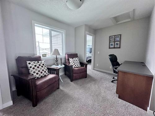 37 Drake Landing Ridge, Okotoks, AB - Indoor Photo Showing Other Room