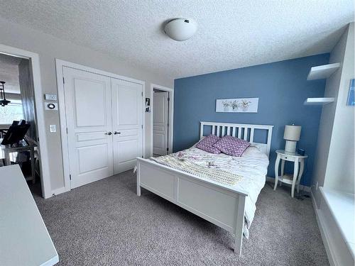 37 Drake Landing Ridge, Okotoks, AB - Indoor Photo Showing Bedroom