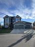 37 Drake Landing Ridge, Okotoks, AB  - Outdoor With Facade 