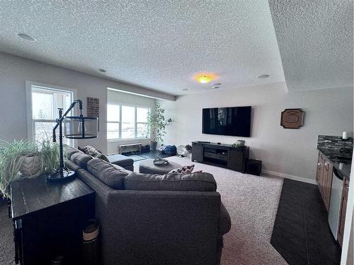 37 Drake Landing Ridge, Okotoks, AB - Indoor Photo Showing Living Room