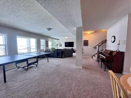 37 Drake Landing Ridge, Okotoks, AB - Indoor Photo Showing Other Room