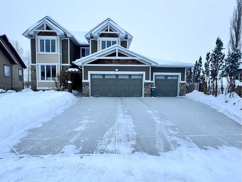 37 Drake Landing Ridge, Okotoks, AB - Outdoor With Facade