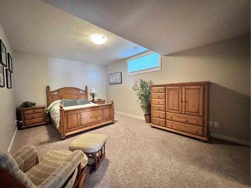 37 Drake Landing Ridge, Okotoks, AB - Indoor Photo Showing Bedroom