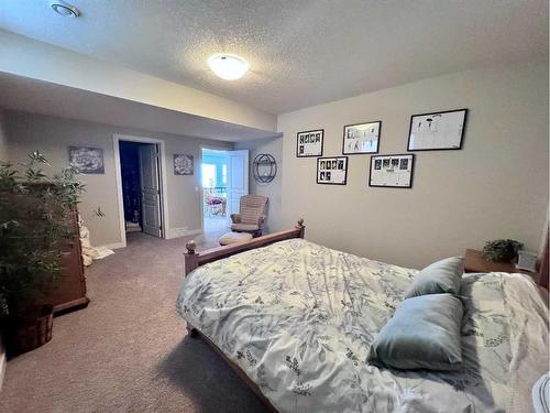 37 Drake Landing Ridge, Okotoks, AB - Indoor Photo Showing Bedroom