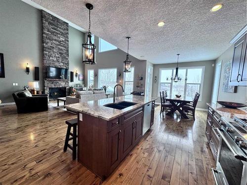 37 Drake Landing Ridge, Okotoks, AB - Indoor Photo Showing Kitchen With Double Sink With Upgraded Kitchen