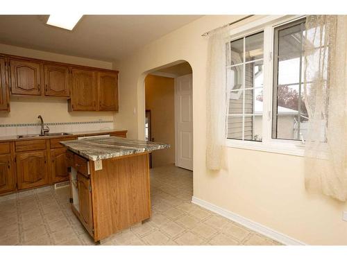 3537 Spruce Drive, Red Deer, AB - Indoor Photo Showing Kitchen With Double Sink