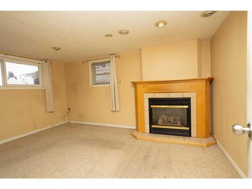 3537 Spruce Drive, Red Deer, AB - Indoor With Fireplace