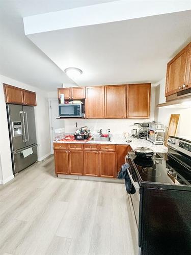 5120A-5120 48 Street, Rocky Mountain House, AB - Indoor Photo Showing Kitchen