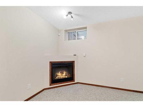 9 Lanterman Close, Red Deer, AB - Indoor With Fireplace