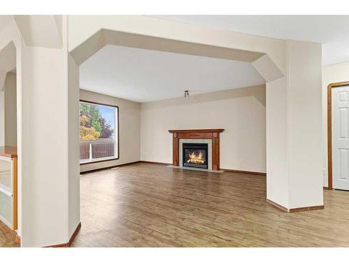 9 Lanterman Close, Red Deer, AB - Indoor Photo Showing Living Room With Fireplace