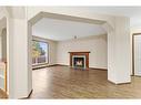 9 Lanterman Close, Red Deer, AB  - Indoor Photo Showing Living Room With Fireplace 