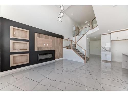 2916 1 Avenue, Edmonton, AB - Indoor Photo Showing Other Room With Fireplace