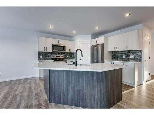 5032 59 Street, Innisfail, AB - Indoor Photo Showing Kitchen With Stainless Steel Kitchen With Upgraded Kitchen