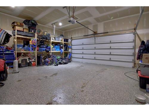 73 Chinook Street, Blackfalds, AB - Indoor Photo Showing Garage