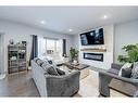 73 Chinook Street, Blackfalds, AB  - Indoor Photo Showing Living Room With Fireplace 