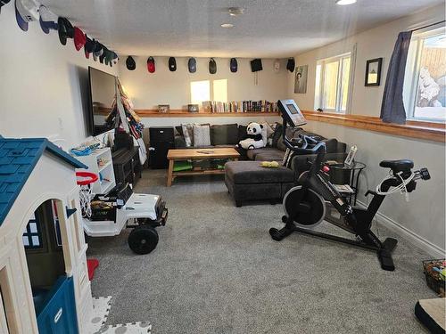 5703 46 Avenue, Stettler, AB - Indoor Photo Showing Gym Room