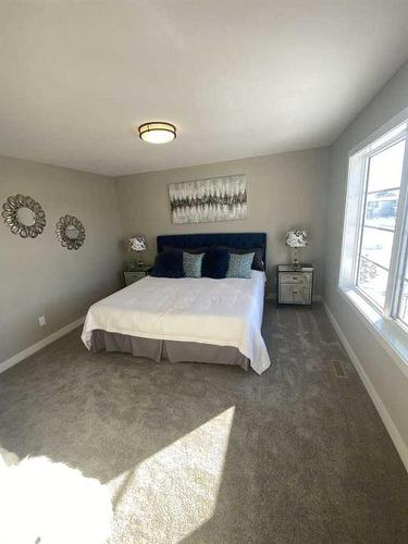 90 Memorial Parkway, Rural Red Deer County, AB - Indoor Photo Showing Bedroom