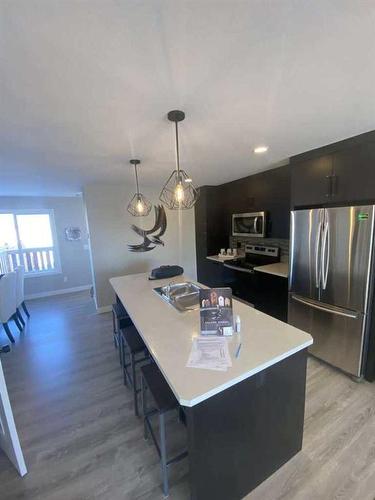 90 Memorial Parkway, Rural Red Deer County, AB - Indoor Photo Showing Kitchen